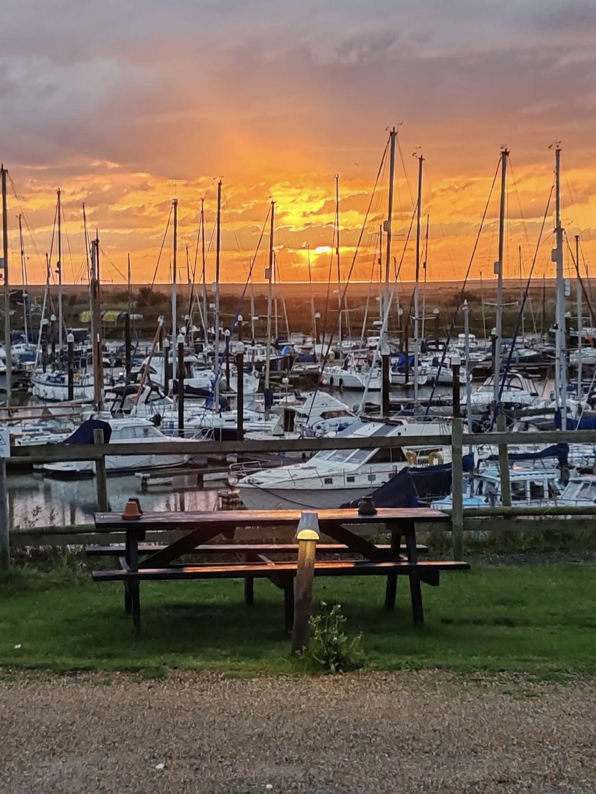 Sunset over the boats at Tollesbury Marina